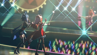 two anime characters are dancing on a stage in front of a crowd of people .