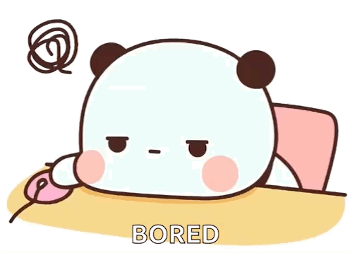A cute panda-like cartoon character sits at a desk, captioned “BORED.”