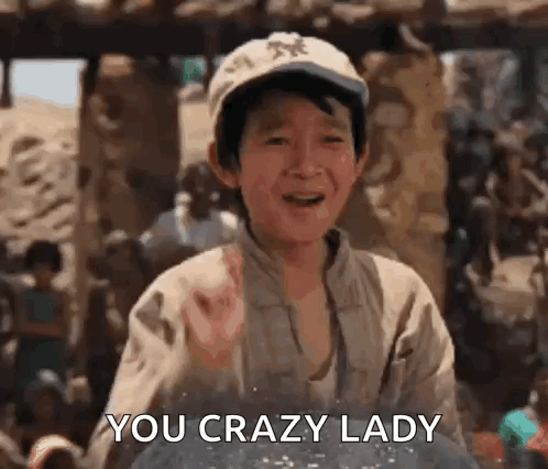 A man gestures with a raised finger as subtitles read “YOU CRAZY LADY.”