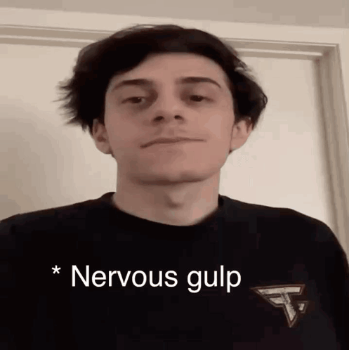 a young man with a nervous gulp on his shirt