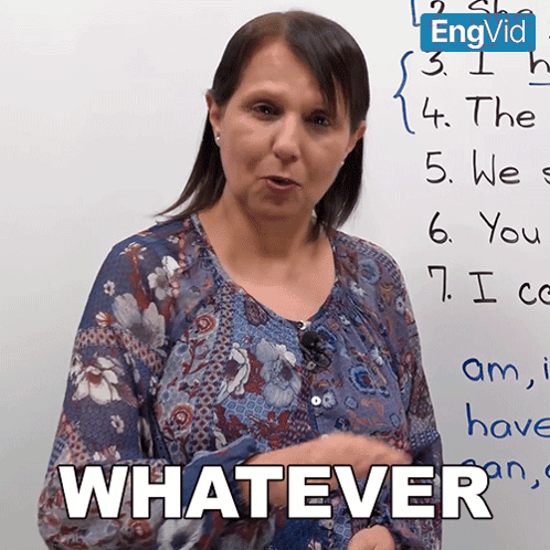 a woman stands in front of a white board with the word whatever written on it
