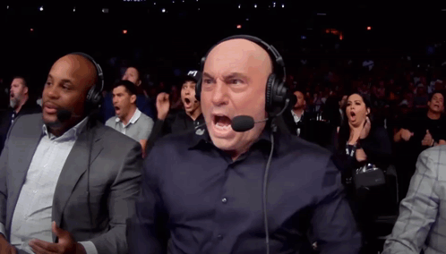 a man wearing a headset with the letter p on it screams
