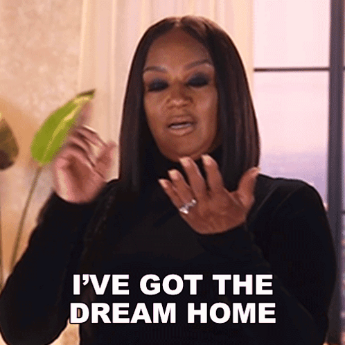 a woman is saying i 've got the dream home .
