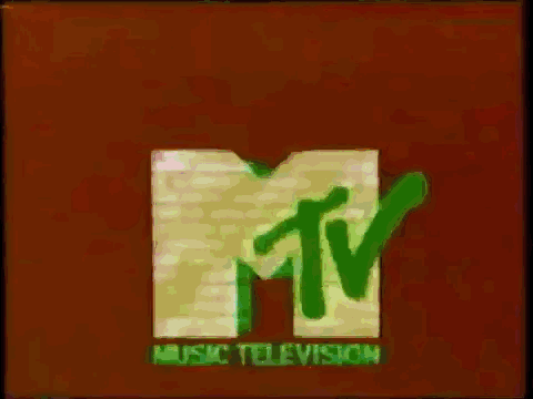 a pink and blue mtv logo is on a brown background