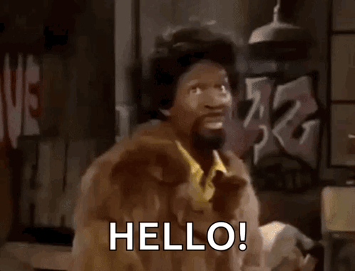 Martin Lawrence turns toward the camera with “HELLO!” text.