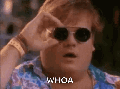 A man in sunglasses reacts with the caption “WHOA.”