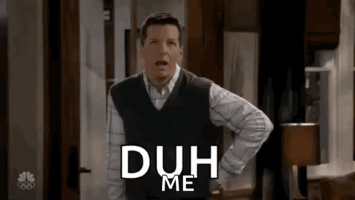 Sean Hayes as Jack McFarland stands with one hand on his hip beneath “DUH”.