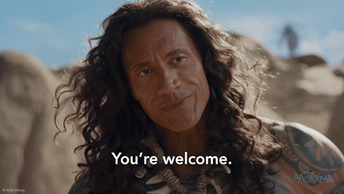 Maui from Moana smiles outdoors with the caption “You’re welcome.”