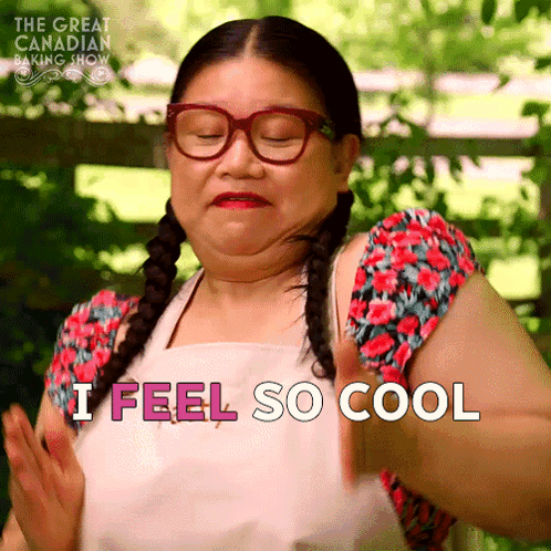 a woman wearing glasses and an apron is saying i feel so cool