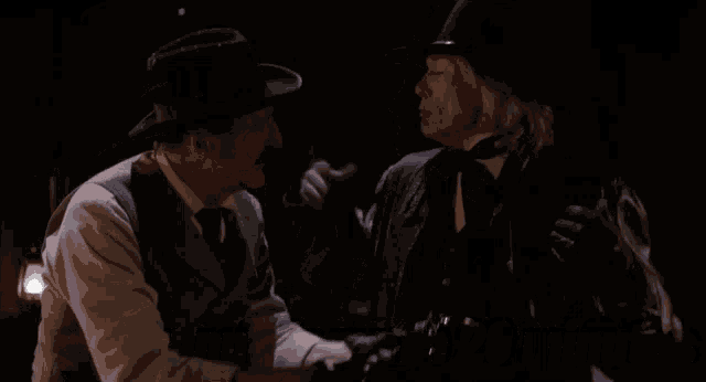two men are standing next to each other with the words twenty years written above them