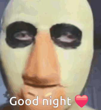 a person with a mask on says good night with a heart