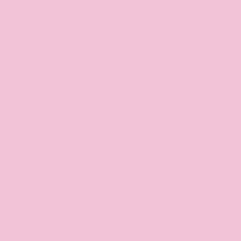a red box with a flower on it sits next to a pink box