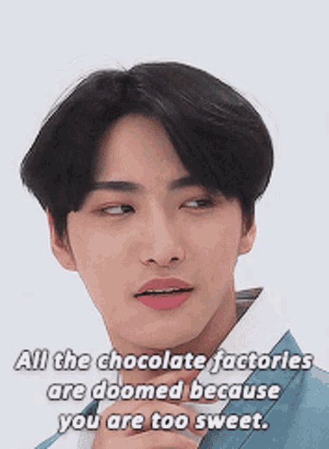 a close up of a young man 's face with a caption that says all the chocolate factories are doomed