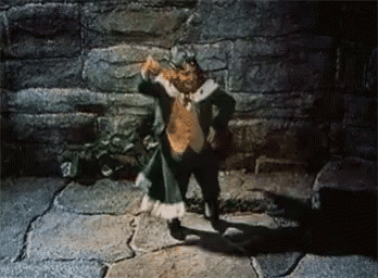 a leprechaun is dancing on a stone floor in front of a brick wall