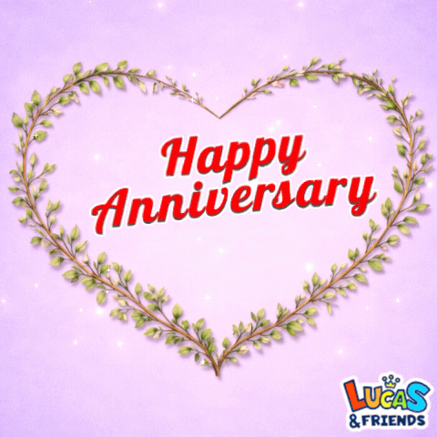 a heart shaped wreath of pink roses with the words happy anniversary