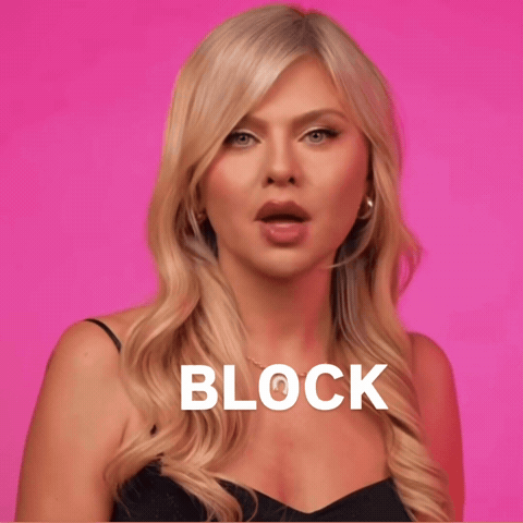 a woman with a surprised look on her face and the word block on the bottom