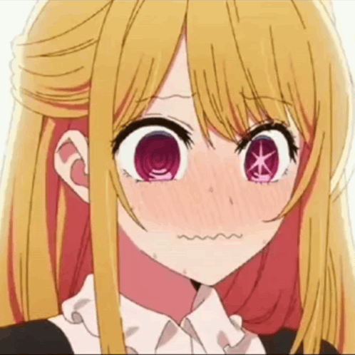 Ruby Hoshino blushes deeply and trembles with a worried smile.