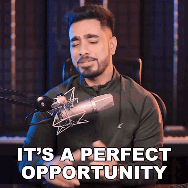 a man singing into a microphone with the words it 's a perfect opportunity above him