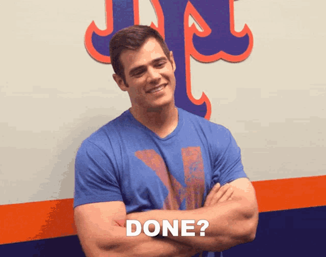 a man with his arms crossed says " done "