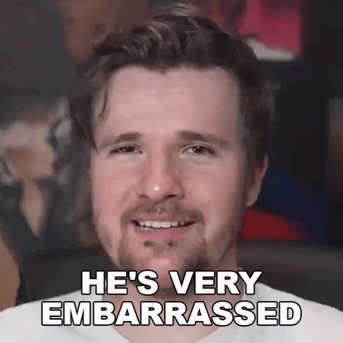 a man with a beard is making a funny face and saying `` he 's very embarrassed '' .