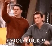 Chandler and Joey from Friends cheer with raised arms under the caption “GOOD LUCK!!!”