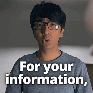 a man with glasses says " for your information " in front of his face