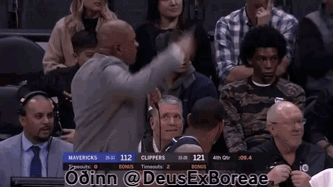 a basketball game between the mavericks and the clippers is being played