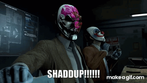 two men wearing masks are standing next to each other with the words shaddup written on the bottom