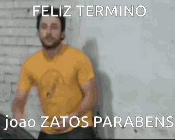 a man in a yellow shirt with the words feliz termine joao zatos parabens