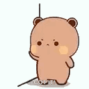 Dudu holds a long stick with a blank, stern expression.