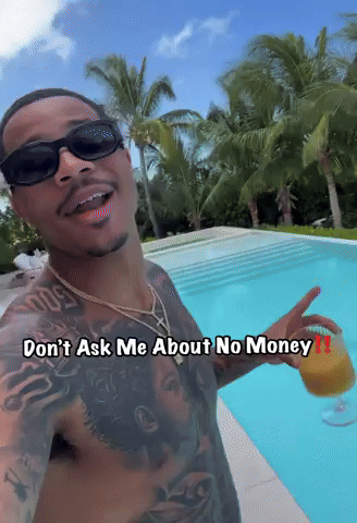 a shirtless man holding a drink in front of a pool with the words " don t ask me about no money "