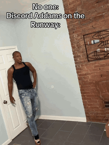 a man standing in front of a door with a caption that says " no one discord addams on the runway "