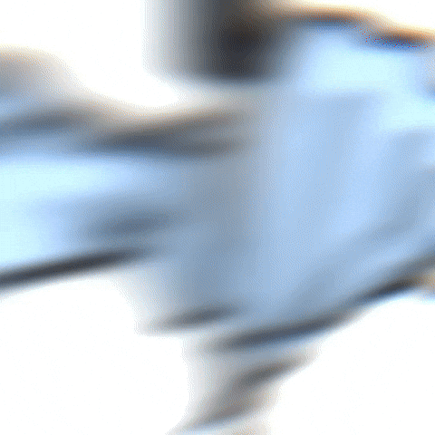 a blurred image of a person 's face with a white background