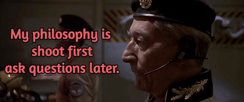 a man in a military uniform has a microphone on his head and the words my philosophy is shoot first ask questions later