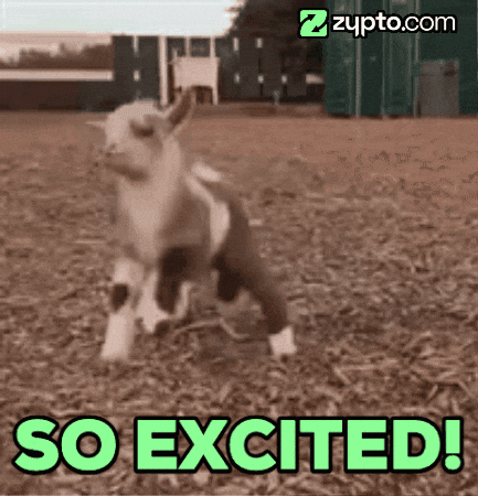 A baby goat leaps in a field under the green caption “SO EXCITED!”