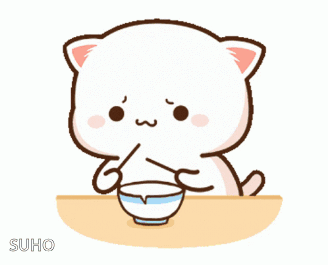 A cute white cat holds a small bowl at a table.