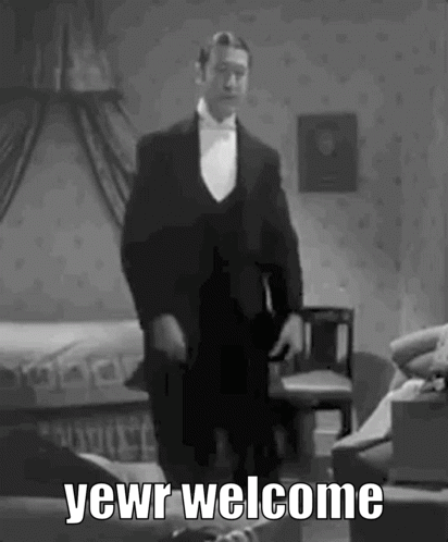 A man in a tuxedo performs a formal bow in a black-and-white scene.