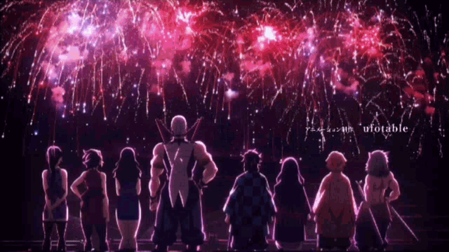 a group of people standing in front of a fireworks display with the word ufotable on the bottom right