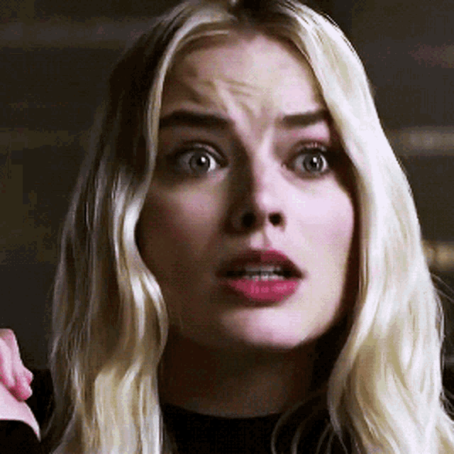A blonde woman looks shocked and says “Heyy, you are crazy.”