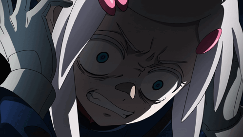 A frightened anime girl stares wide-eyed in a dark futuristic scene.