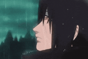 a close up of a man 's face in the rain with trees in the background .