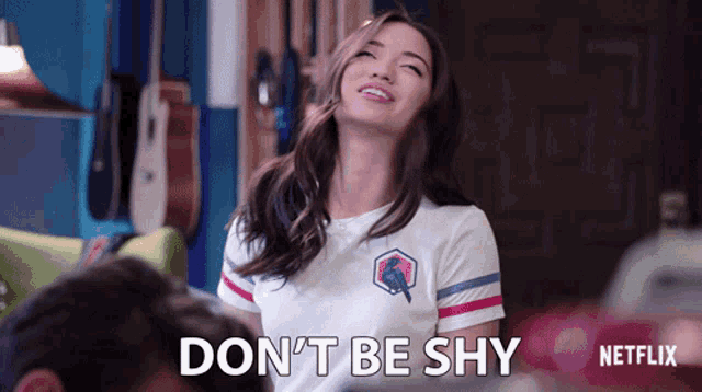 a woman says " don 't be shy " in a netflix advertisement
