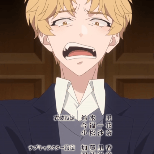 a man in a suit is making a funny face with chinese writing behind him