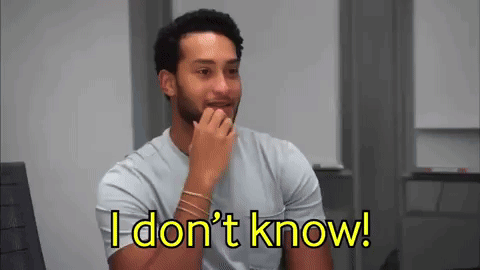 a man is sitting in a chair with his hand on his chin and the words `` i don 't know '' above him .
