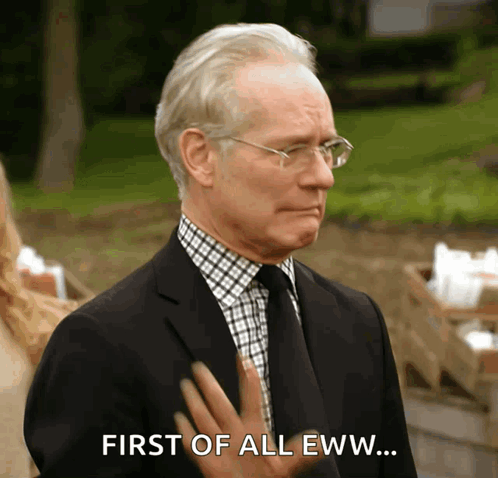 A man in a suit makes a repelled face with the caption “FIRST OF ALL, EWW…”