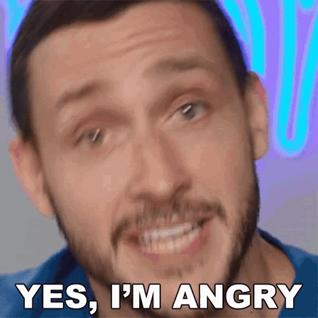 a man says yes i 'm angry in a blurry photo