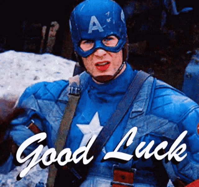 Captain America smiles in uniform with cursive “Good Luck” text across the image.