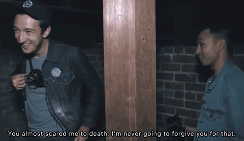 two men standing next to each other with one saying you almost scared me to death i 'm never going to forgive you