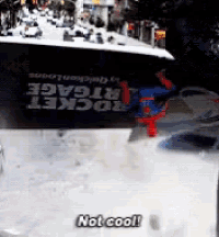 a sign that says rocket rigage on it with a spiderman on it