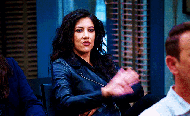 Rosa Diaz holds up her hand for a high five.